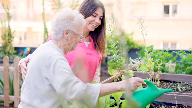 woman gardening with senior